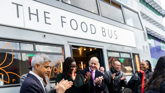 Photo of Food Bus launch event including Mayor standing outside bus