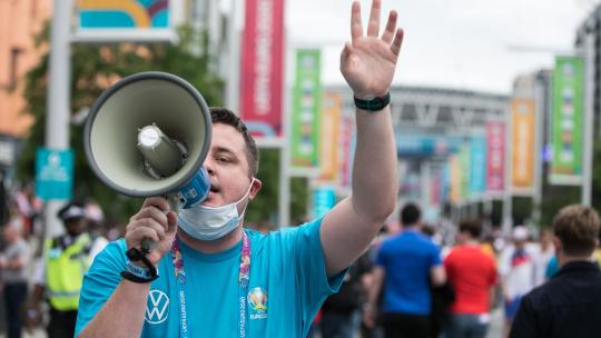Man shouting into megaphone 