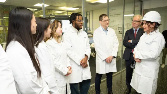 group of people wearing lab coats