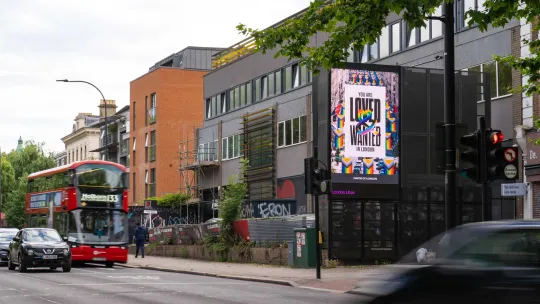 Loved and Wanted digital display screen on building in London
