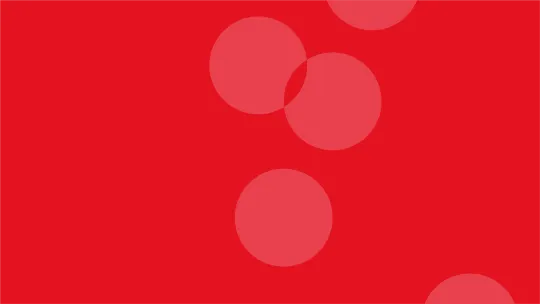Light red circles on a red background
