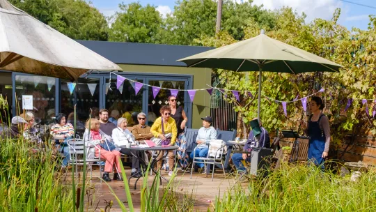  Singer in garden with Sutton Befrienders volunteers  