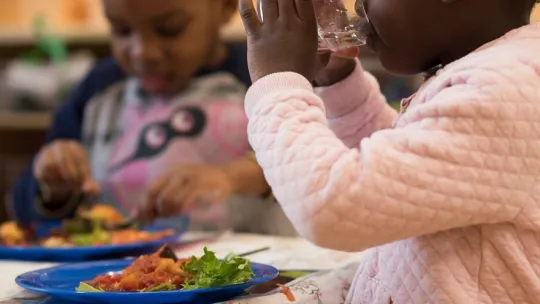Nursery children having lunch