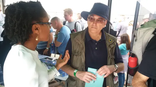 People discussing at OPDC community event