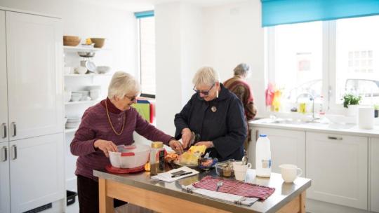 Older people cooking