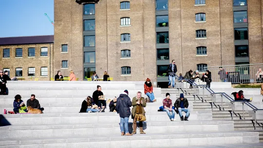 People gathered outside on steps