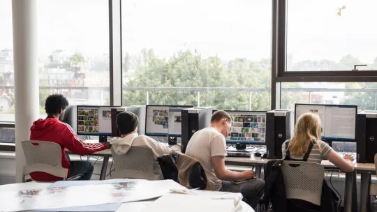 Students researching on computers