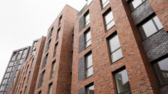 View of windows of council housing in Camden, London.