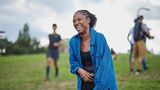 Young woman smiling while outdoors