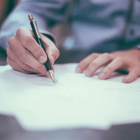 Person signing contract