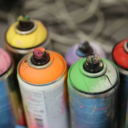 selection of paint bottles in different colours