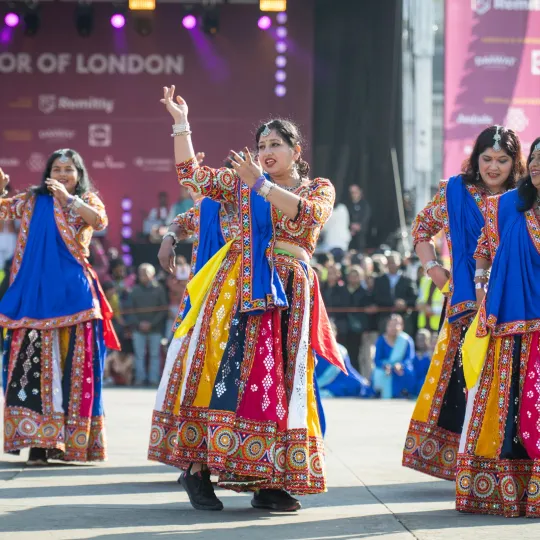 dancers in brightly coloured clothing
