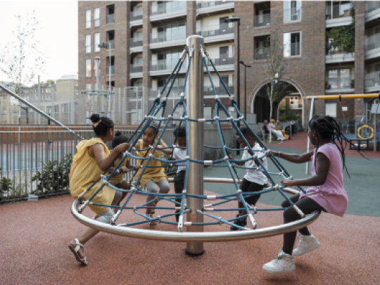 Children playing in a new playground