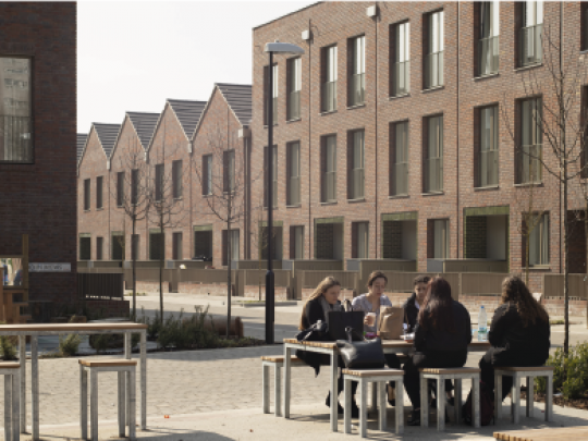 Young people using public space in a waterside development