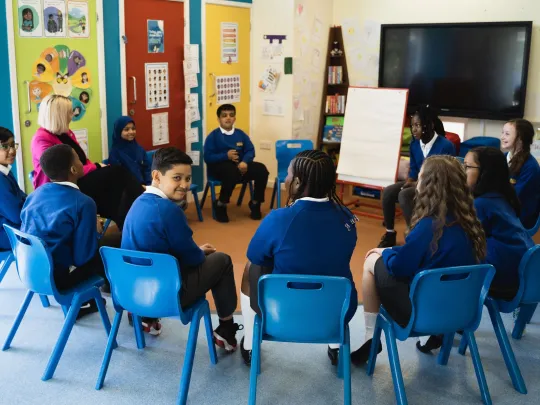 Primary school children in classroom.