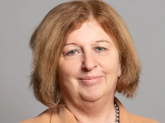 Headshot photo of Karen Buck smiling