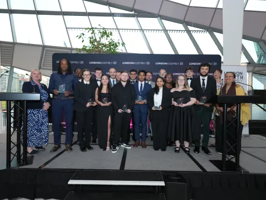 people on stage for awards ceremony