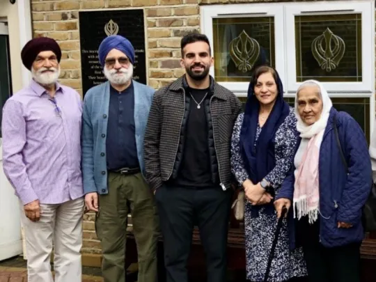 Mete Coban at the Gurdwara Sahib Woolwich with community leaders
