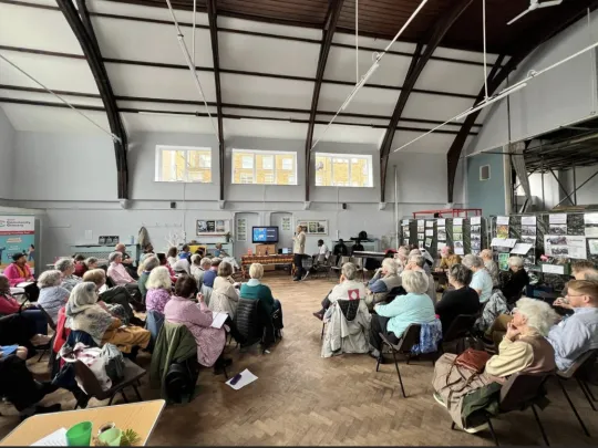 People sitting in Vine URC Church in Ilford
