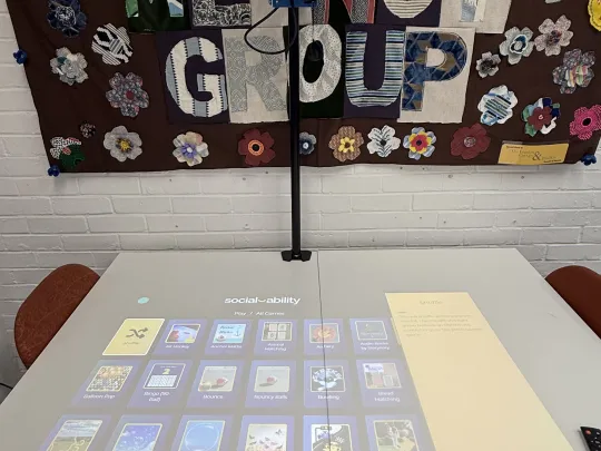 Magic Table, interactive light-projection system used by group members to support cognitive stimulation and social interaction