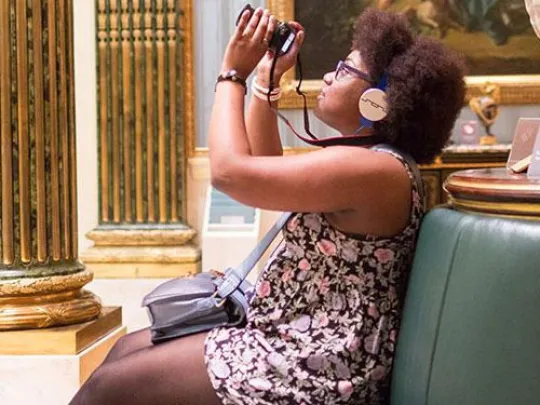 girl taking photo