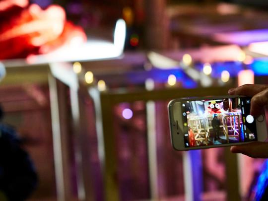 Londoners engaging with public art and light installations as part of the Southall Light Show festival