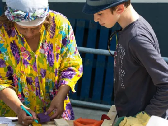 People borrowing and working with equipment from the Library of Things