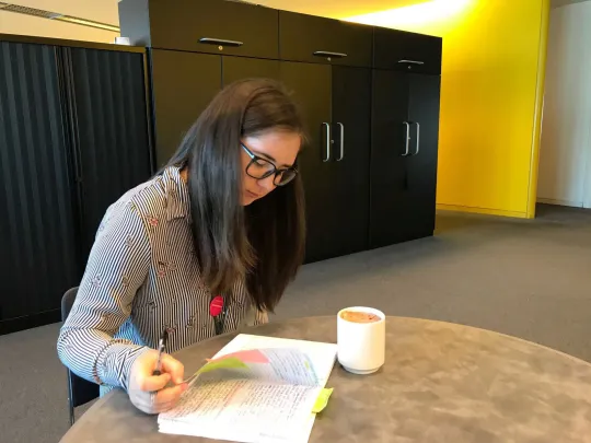 Georgina looking over notes