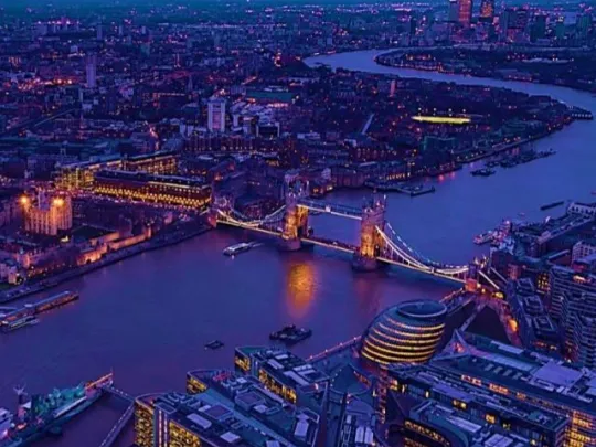 A birds eye view of Tower Bridge at night