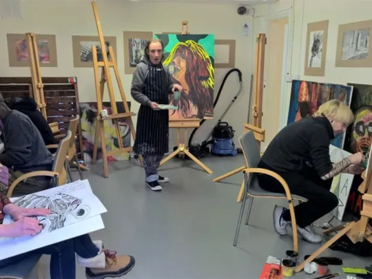 An art class at the Shine Cafe