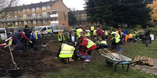Abbey Wood Environment with group of people digging