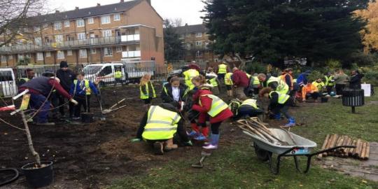 Abbey Wood Environment with group of people digging 