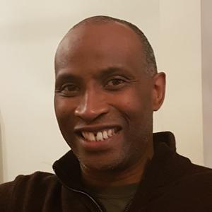ade banjoko front face smiling 