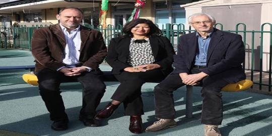 Ealing school programme strategies Three people sitting on a bench outdoor play ground 