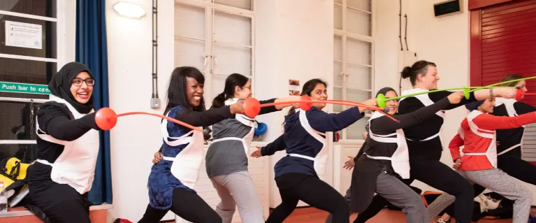 Muslim girls fencing