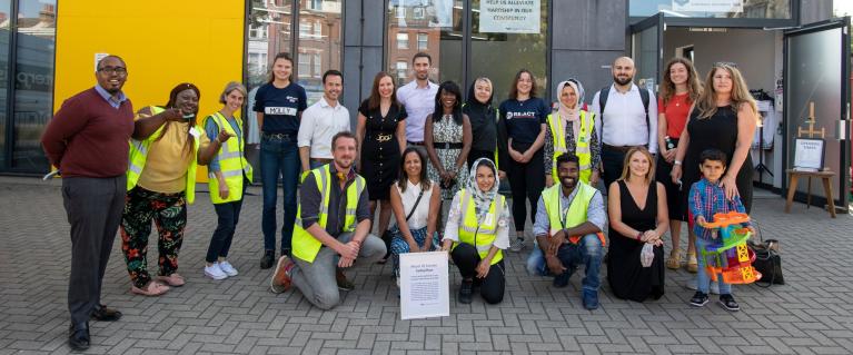 Volunteers posing for picture outside Lewisham Donation Hub