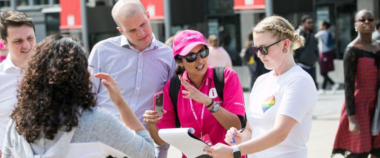 Team London Ambassadors providing information to people as part of Let's Do London campaign event