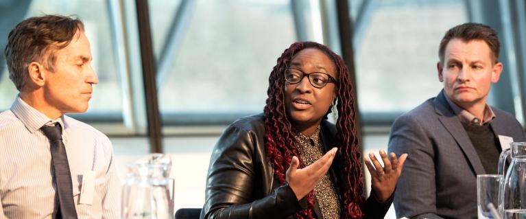 Panel debating at a LondonED research conference