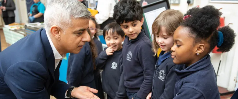 Mayor of London, Sadiq Khan, in a London school with young students.