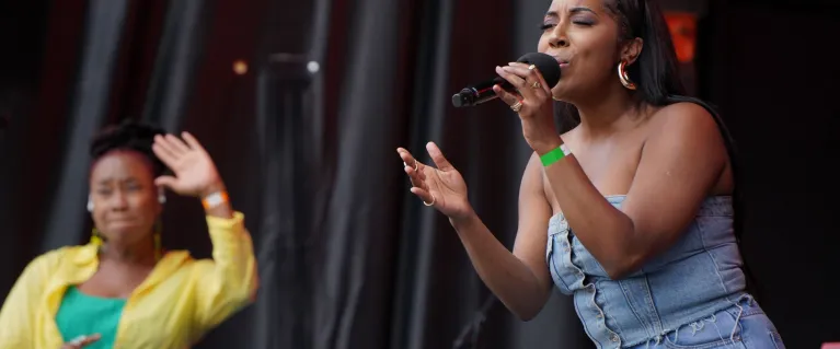 A singer performing on stage