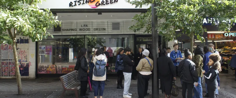 People gathered on the high street outside the opening of Rising Green youth hub in Haringey