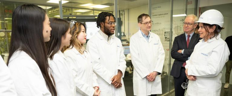 group of people wearing lab coats