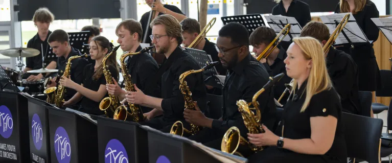 young people playing in an orchestra