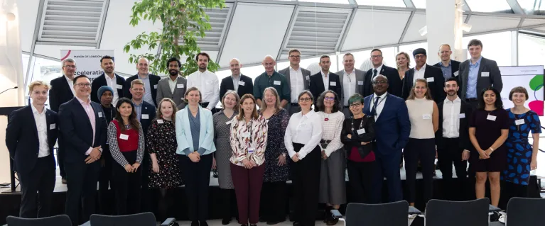 Group photo of the Zero Carbon Accelerator Alliance in City Hall