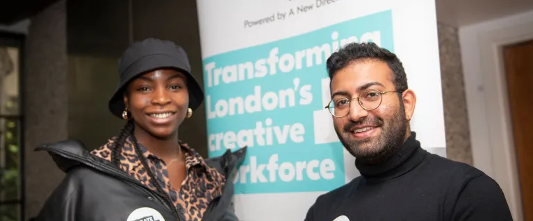 Two people smiling at the Mayor of London’s Youth Digital Careers event, Future x Skills