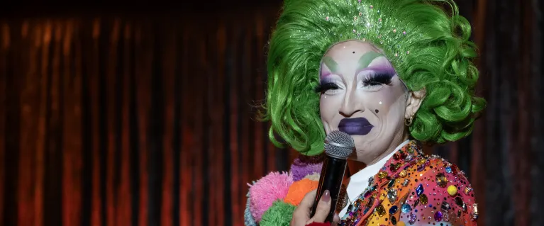 Drag queen in colourful clothes at Liberty Festival 