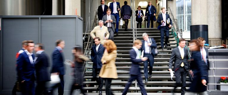 Business people walking on London street in the City