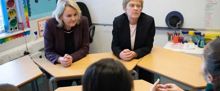 Conversations in a classroom with adults and students