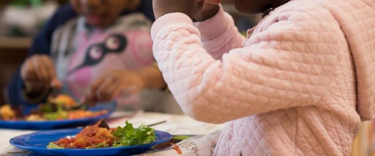 Nursery children having lunch