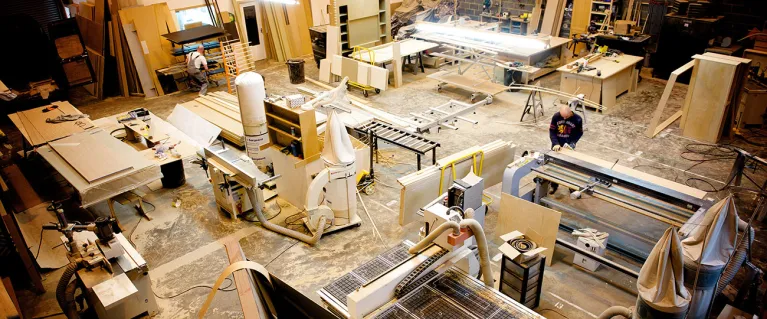 Production warehouse filled with wood and tools